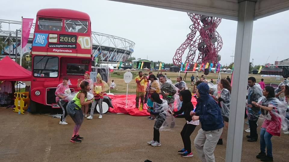 Michelle Felix instructs outside in the rain